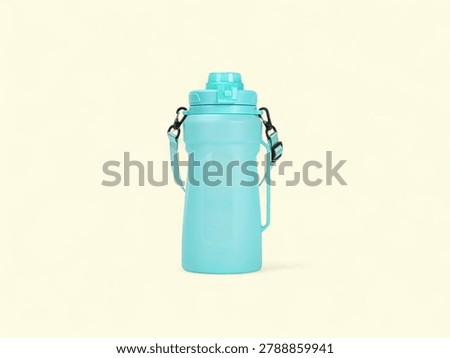Durable teal plastic hydration bottle with convenient carrying handle strap