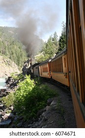 Durango And Silverton Train Running Along The River