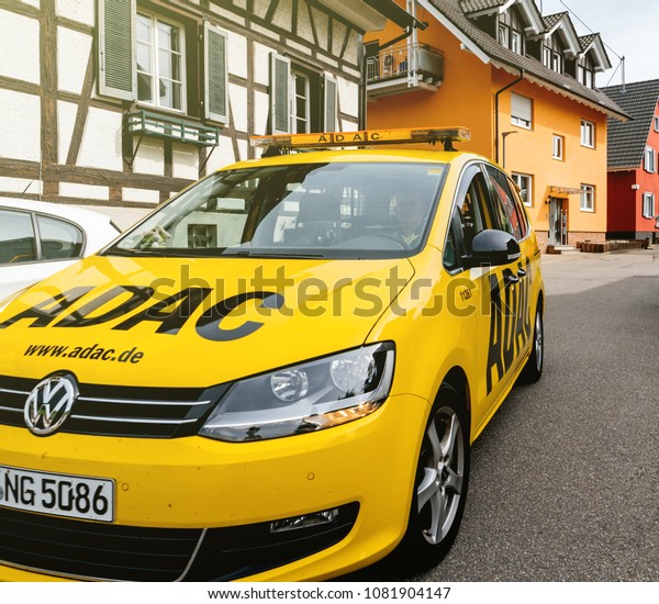 DURBACH, GERMANY -\
APR 29, 2018: Security safety car from the ADAC driving on calm\
German city of Durbach. ADAC is the abbreviation of Allgemeiner\
Deutscher\
Automobil-Club