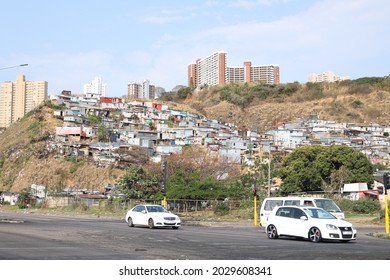 Durban, South Africa - 08 23 2021: A township on the side of busy road