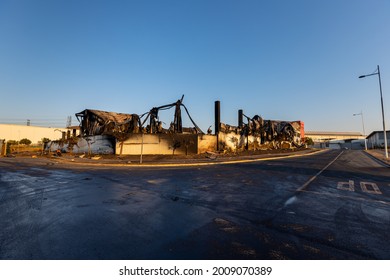 Durban, South Africa, 15 July 2021. A warehouse lies entirely burnt in the aftermath of violent protests that passed through the industrial area north of the city