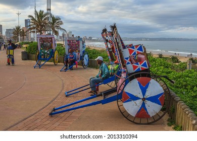 Durban, South Africa - Dec 11 2020: Rickshaw Drivers On Sea Promenade