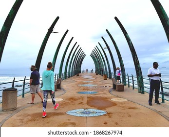 DURBAN, SOUTH AFRICA - DECEMBER 03, 2020: People Walking On The Umhlanga Pier