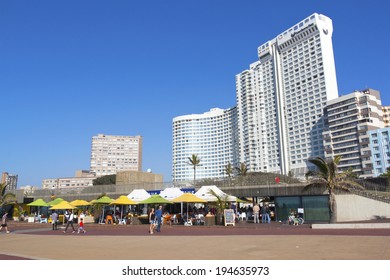 DURBAN, SOUTH AFRICA - MAY 24, 2014: Many People Enjoy Food And Refreshments At Promenade Restaurant On Beachfront In Durban South Africa