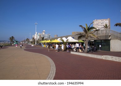 DURBAN, SOUTH AFRICA - MAY 24, 2014: Many People Enjoy Food And Refreshments At Promenade Restaurant On Beachfront In Durban South Africa