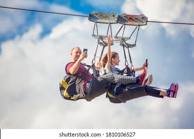 Durdevica Tara / Montenegro - September 2018:Zip Line With Two Young People. Romantic Couple Take A Selfie On The Zipline