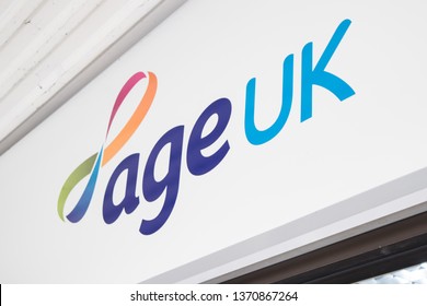 Durham / Great Britain - March 02, 2019 : Exterior Of Age UK Charity Shop Store Showing Sign, Signage, Logo And Branding Above Entrance