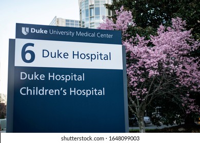 Durham, NC - February 3 2020: Duke University Hospital And Children's Hospital Sign With Cherry Blossoms