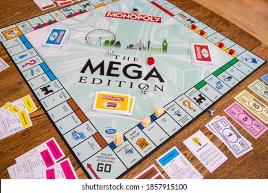 Durham, UK - 17th Nov 2020: Newley Released Mega Edition Monopoly. New Twist On Classic Fast-dealing Property Trading Board Game (Hasbro Games). Financial, Banking, Buying Property, First Home Concept