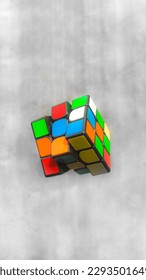 Duri, Riau, Indonesia - Desember 30, 2022:  A floating rubik's cube on a concrete background In Duri, Riau, Indonesia on December 30, 2022 - Shutterstock ID 2293501649