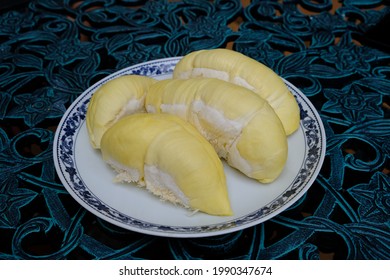 Durian On White Plate In Background. Durian The King Of (tropical) Fruits. Thai Fruit. Asian Fruit.