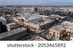 During a break in the fog, afternoon sunlight shines on the historic city center of downtown Salinas, California, USA.