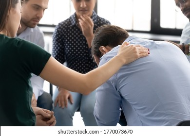 During Group Therapy Session Participants Supporting Crying Desperate Guy, Provide Psychological Assistance Talking Encouraging Words Share Mental Pain Try To Help, Struggle With Addictions Treatment