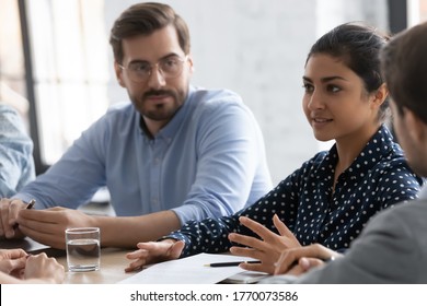 During negotiations focus on Indian team leader express opinion advising solutions. Business parties discuss contract terms. Leadership corporate training formal meeting briefing communication concept - Shutterstock ID 1770073586