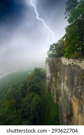 during a storm in the mountains lightning. clouds like fog
