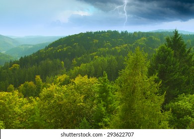 during a storm in the mountains lightning. clouds like fog