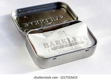 DUSHANBE, TAJIKISTAN - AUGUST 26, 2022: Barkleys Tastefully Intense Mints With Cinnamon Flavour Metal Package Box On White Background