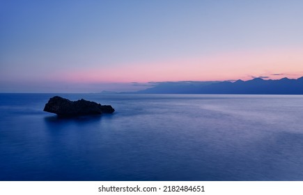 Dusk And Dawn Landscape. Beautiful Antalya Sea Bay At Sunset Evening Time.