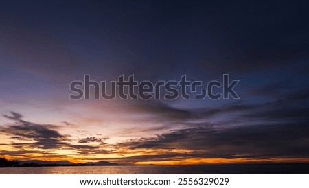 Dusk, Evening Sky Clouds on Twilight over Sea, Dramatic horizon Orange Sunset sea Summer sky Golden Hour on Landscape nature dark Blue Sky Background