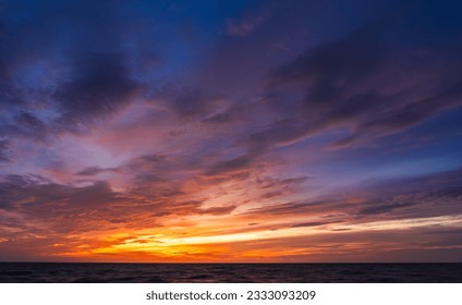 Dusk, Evening Sky on twilight over sea, Dramatic horizon sunset sea sky Golden on nature dark blue background 