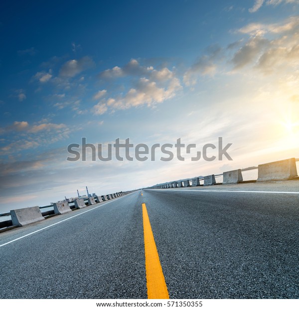 At\
dusk highway, modern transportation fantasy\
landscape