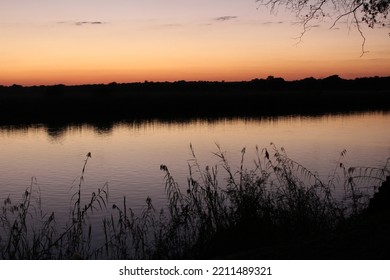 Dusk On The Okavango River