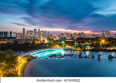 Dusk Over Ban Nguyet Lake With Starlight Bridge By The Weekend, The Central  Of Phu My Hung, District 7 (new Urban/city Area Ho Chi Minh City, Vietnam)