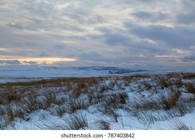 Dusk Over A Brecon Beacons Snow Landscape In Winter. 