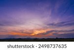 Dusk Sky, Evening sky on twilight Dark Blue Hour after sun down, Horizon landscape over silhouette mountains countryside with Purple , Red, Orange sunset sunlight and Dramatic clouds in summer season