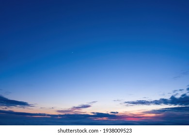 Dusk Sky in the Evening,Amazing Dramatic and Wonderful Cloud on Twilight,Majestic Dark Blue Sky Nature Background,Colorful Cloud on Sunset,Idyllic Dusk peaceful sunlight on nightfall. - Shutterstock ID 1938009523