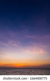 Dusk sky vertical over sea in the evening on twilight sunset. - Shutterstock ID 1664400775