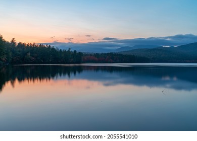 dusk sunlight and sky above lake in the mountain - Powered by Shutterstock