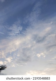 Dusky Cirrus Clouds Float Through The Earth's Surface