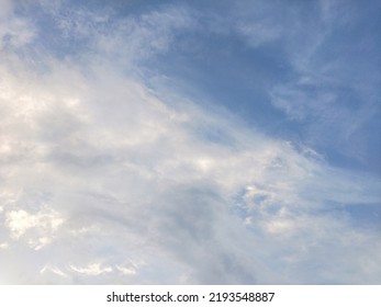 Dusky Cirrus Clouds Float Through The Earth's Surface