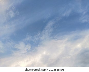 Dusky Cirrus Clouds Float Through The Earth's Surface