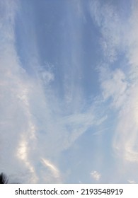 Dusky Cirrus Clouds Float Through The Earth's Surface