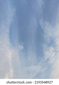 Dusky Cirrus Clouds Float Through The Earth's Surface