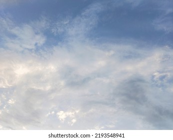 Dusky Cirrus Clouds Float Through The Earth's Surface