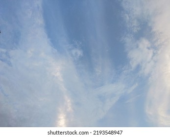 Dusky Cirrus Clouds Float Through The Earth's Surface