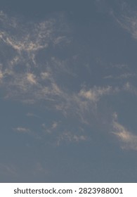 Dusky sky texture background with clouds and copy space