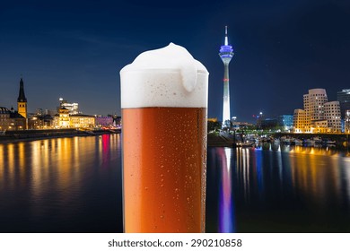 Dusseldorf City With Old Beer Glass At Night, Germany