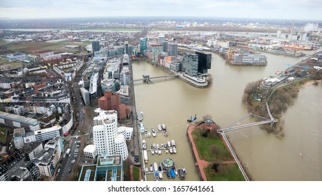 Dusseldorf, Germany - February 20, 2020. Scenic View Of The City Of Dusseldorf, The Embankment Of The River And The Rhine. Aerial View Of A European City In Germany. Aerial View Of A Drone. Panorama.