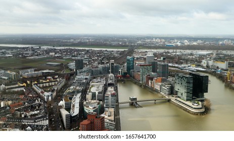 Dusseldorf, Germany - February 20, 2020. Scenic View Of The City Of Dusseldorf, The Embankment Of The River And The Rhine. Aerial View Of A European City In Germany. Aerial View Of A Drone. Panorama.