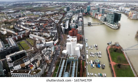 Dusseldorf, Germany - February 20, 2020. Scenic View Of The City Of Dusseldorf, The Embankment Of The River And The Rhine. Aerial View Of A European City In Germany. Aerial View Of A Drone. Panorama.