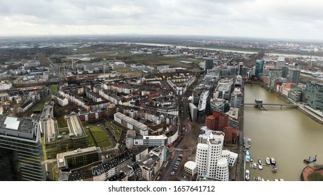 Dusseldorf, Germany - February 20, 2020. Scenic View Of The City Of Dusseldorf, The Embankment Of The River And The Rhine. Aerial View Of A European City In Germany. Aerial View Of A Drone. Panorama.