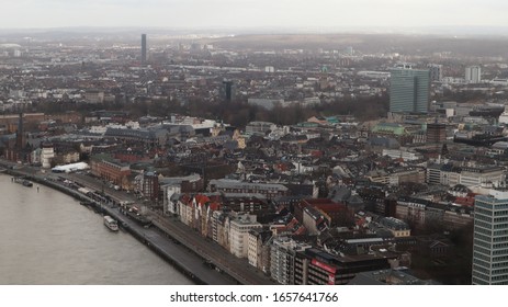 Dusseldorf, Germany - February 20, 2020. Scenic View Of The City Of Dusseldorf, The Embankment Of The River And The Rhine. Aerial View Of A European City In Germany. Aerial View Of A Drone. Panorama.