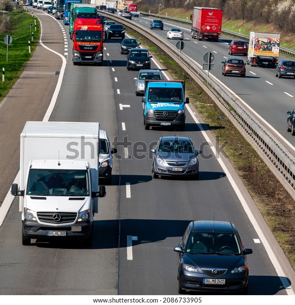 DUSSELDORF ,GERMANY - March  22, 2019:\
Traffic on the highway. traffic  with cars and\
trucks