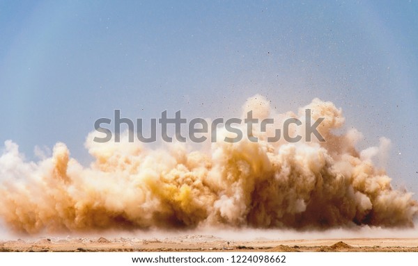 Dust Clouds After Dynamite Blast On Abstract Industrial Stock Image