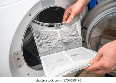 Dust and dirt trapped by the clothes dryer filter.