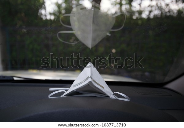 Dust mask in a
car